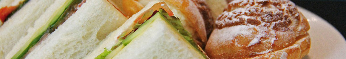 Eating Sandwich at Telegraphe Cafe restaurant in New York, NY.